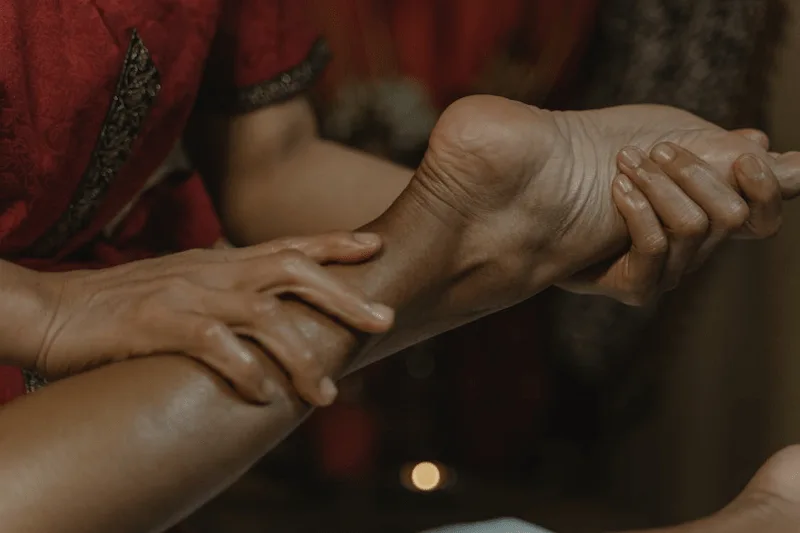 Healthcare provider performing a comprehensive foot assessment to check for nerve damage and neuropathy indicators.